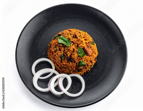 Chettinad Sura Puttu Scrambled Shark On Black Plate Isolated On White Background