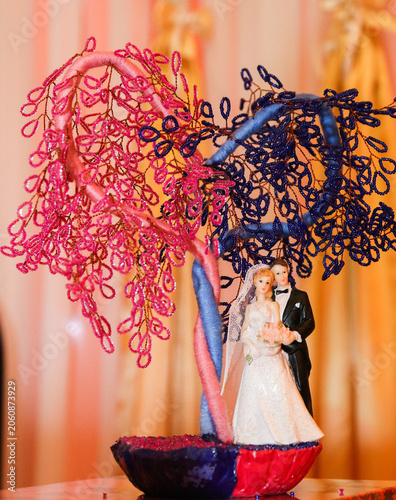 Handcrafted tree with pink and blue beaded branches