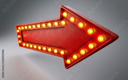 Bright Red Arrow Sign with Light Bulbs Pointing To the Right