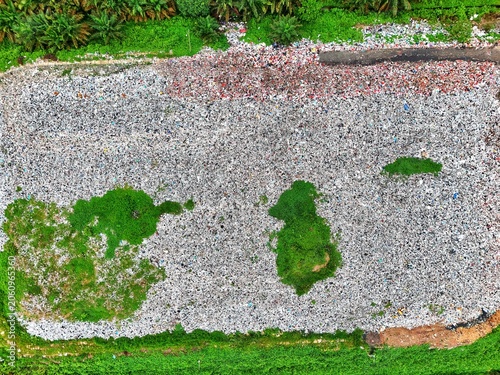 aerial view of gravel with green patches.