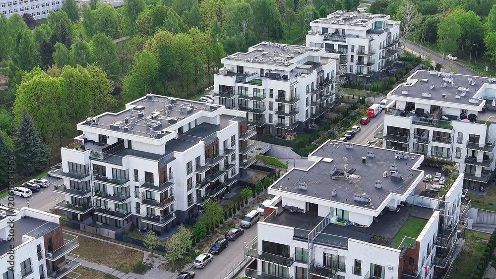 Fototapeta premium Housing estate with parking spaces and trees