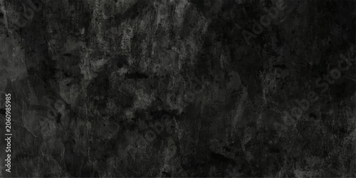 Foto A dark, textured background resembling rough stone or concrete, evoking a sense of raw, industrial, or weathered material