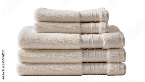 Foto Stack of soft fluffy cream colored bath towels with ribbed texture