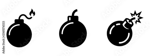 Fotografie Classic cartoon bomb icons set with lit fuse and explosion, black vector illustration