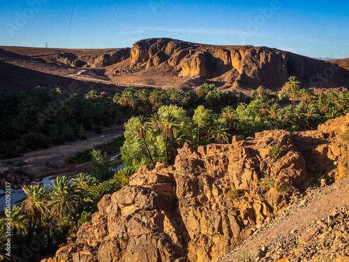 This landscape features the Fint Oasis located near Ouarzazate, Morocco