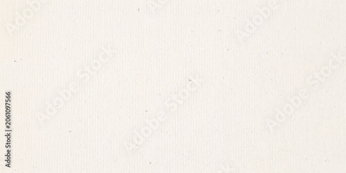 Foto A close-up of a textured paper surface with subtle grain and a uniform light cream color, ideal for background use or graphic design