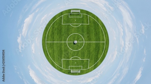 Tiny planet style view of a soccer field with a ball at center and blue cloudy sky football spherical perspective geometric abstract
