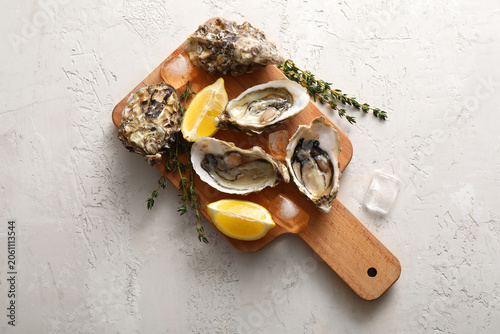 Fresh raw oysters with lemo...