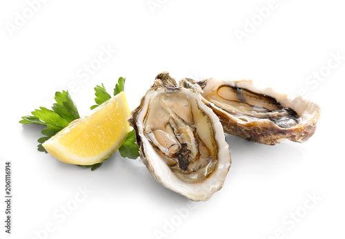 Fresh raw oysters with lemo...