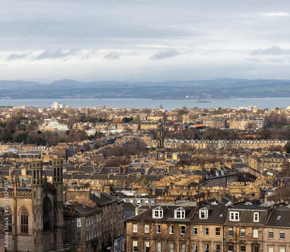 Fototapeta premium Beautiful aerial view of Greenock's waterfront in Scotland, showcasing charming residential neighborhoods