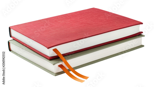 Foto Two stacked hardcover notebooks red and gray covers, with orange ribbon bookmark