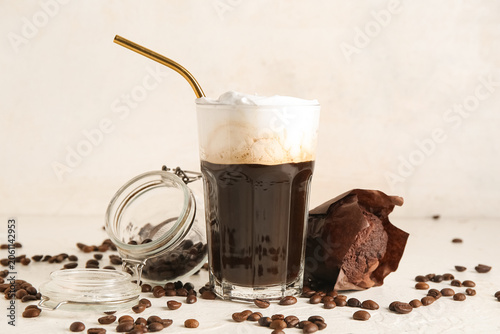 Glass of hot coffee with wh...