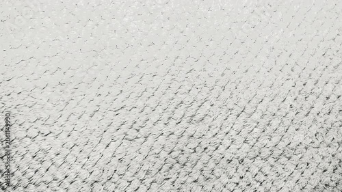 macro tracking shot reveals white textured fabric shifting under soft natural light creating a gentle comforting atmosphere