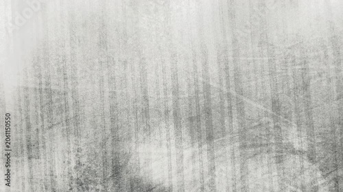 white cotton fabric swaying gently in soft studio light creating subtle shadows during macro tracking shot