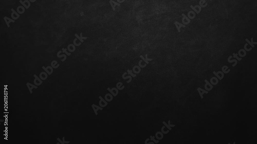 dark black linen fabric texture panning smoothly under soft cinematic studio lighting
