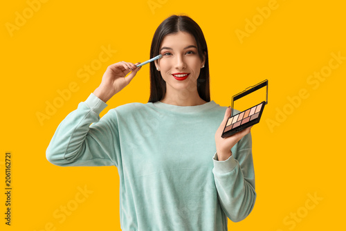 Beautiful young woman with ...