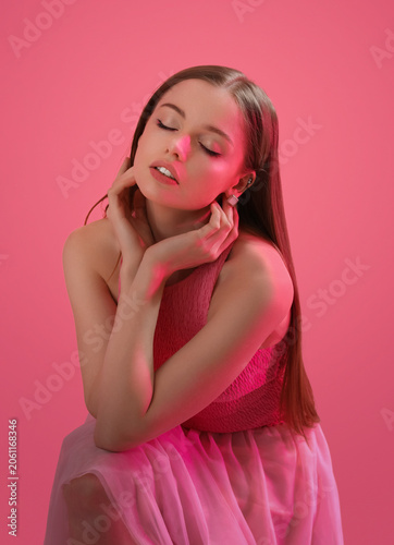 Fashionable young woman on ...