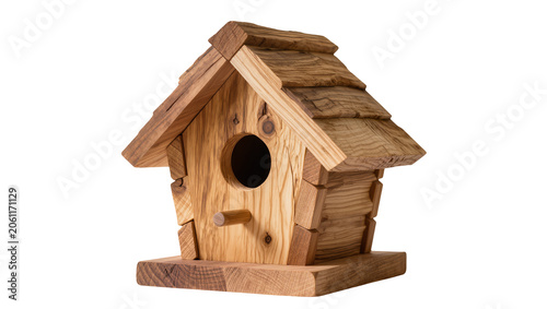 Фотография Rustic wooden birdhouse with perch and shingled roof