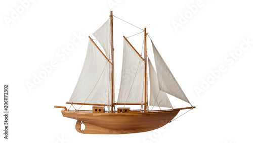 Fotografie Wooden model sailboat with white sails and masts