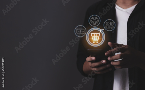 Young Man Hand Holding Smartphone With Online shopping, Mobile payment, Online payment, Digital, Bank account phone, Mobile banking payment concept