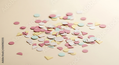 Colorful confetti on white background.