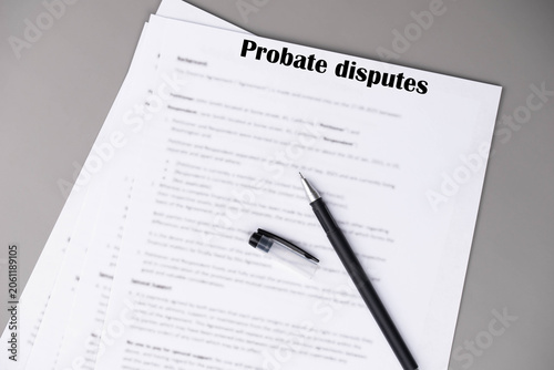 Petition for Probate Dispute document lying on a table, concept of inheritance conflict, court filing, and estate litigation.