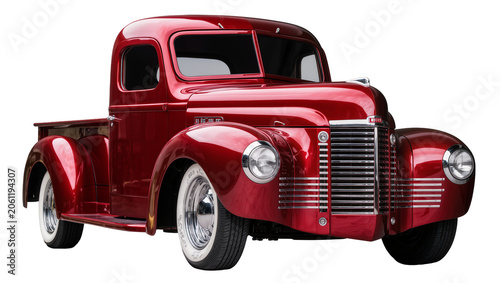 Shiny red vintage pickup truck with chrome grille and whitewall tires, isolated on transparent background