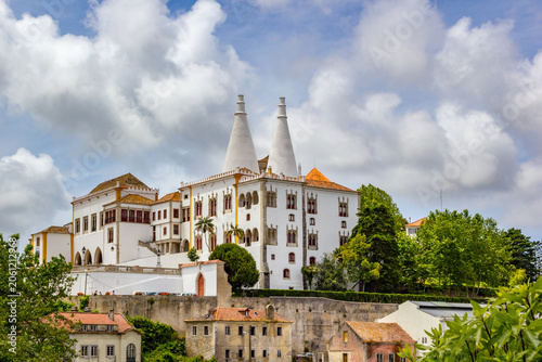 The historic National Palace of Sintra in Portugal displays its iconic white twin conical chimneys
