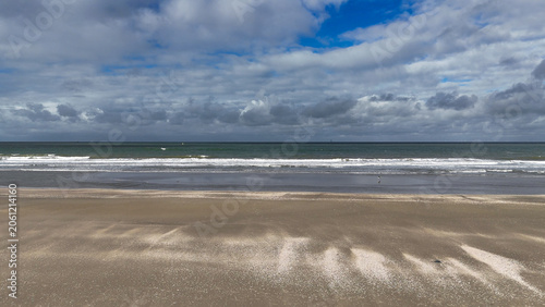 Konstfotografi Aerial drone view of a sandy beach on the English Channel coast of Normandy, France