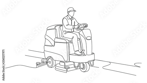 Man driving industrial floor cleaning machine.