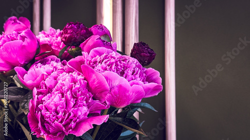 close up of beautiful pink magenta peony bouquet with copy space