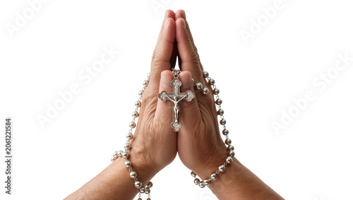 Foto Praying hands holding silver rosary with crucifix