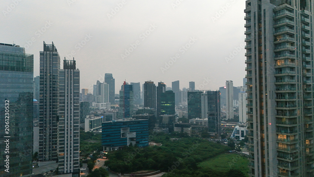 Fototapeta premium Dense Urban Skyline Features Towering Skyscrapers And Modern Highrise Buildings Overlooking Large
