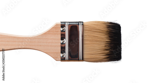 фотографія Wooden handle paintbrush with metal ferrule and brown and black bristles