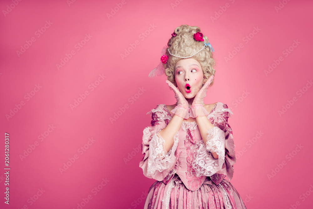 Fototapeta premium Photo of shocked surprised lady princess look empty space wearing antique style dress costume isolated pink color background