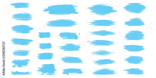 Set of blue paint brush strokes and ink texture shapes for artistic design