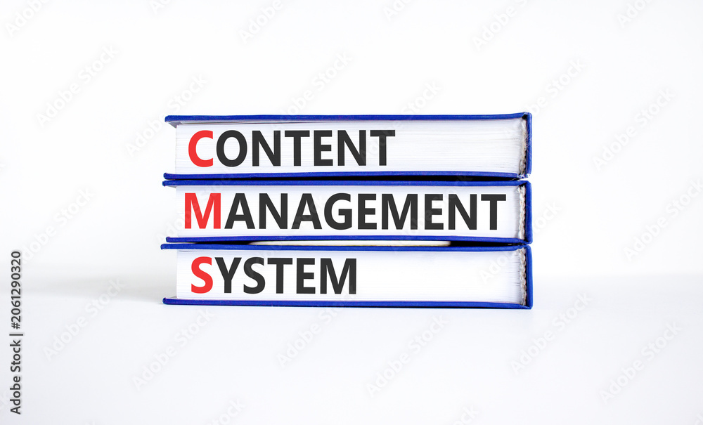 Fototapeta premium CMS content management system symbol. Concept words CMS content management system on beautiful books. Beautiful white background. Business CMS content management system concept. Copy space.