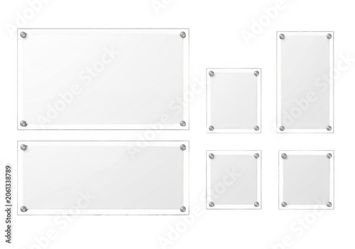 Set of clear acrylic frames with metal standoffs for displaying signs and photos isolated on a white background isolated on transparent background