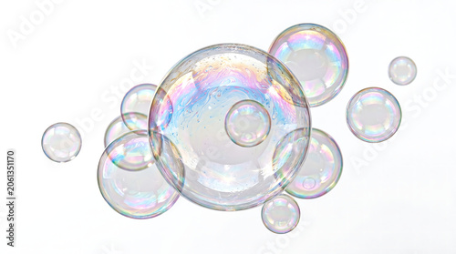 Floating Iridescent Soap Bubbles and Transparent Spheres on a Clean White Background