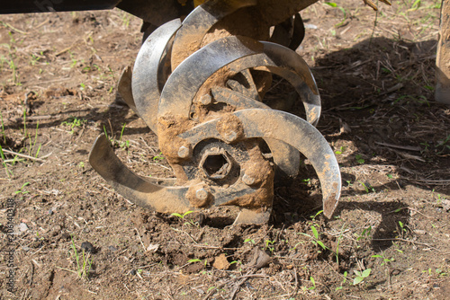 Rotary tiller blade for soil cultivation close up