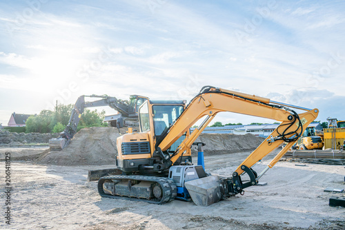 Foto Heavy equipment for earthmoving and excavation works
