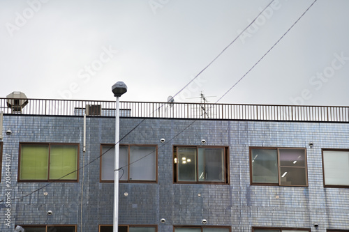 Close-up of the building from the view of street in Sapporo, Hokkaido, Japan. Building exterior. Background use. Cityscape and travel scene.