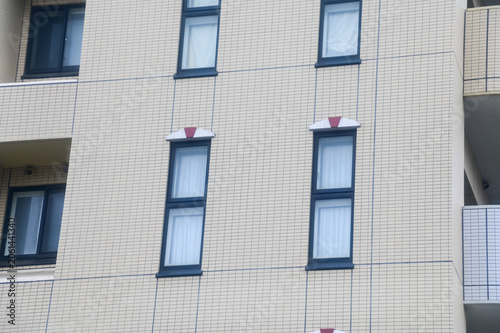 Close-up of the building from the view of street in Sapporo, Hokkaido, Japan. Building exterior. Background use. Cityscape and travel scene.