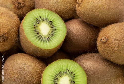  Kiwi Fruit - background. Close-up juicy kiwi fruits.