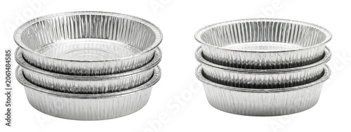 Stack of empty disposable aluminum foil pie pans isolated on transparent background