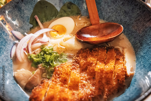 Tableau sur toile Authentic Japanese tonkatsu ramen bowl, rich with creamy broth, crispy pork cutl