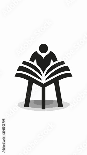 A person reading a large book.