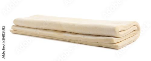 Foto Raw puff pastry dough isolated on white