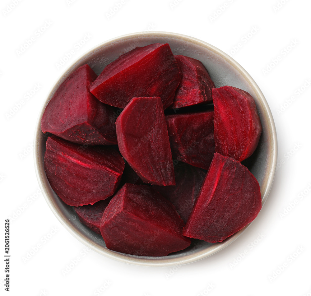 Fototapeta premium Pieces of boiled beets in bowl isolated on white, top view