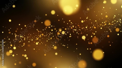 Elegant Golden Bokeh Particles Flow on Dark Background for Festive Celebrations.